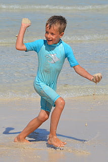 child, boy, fun, play, sea, people, uv-resistant clothing, water HD wallpaper