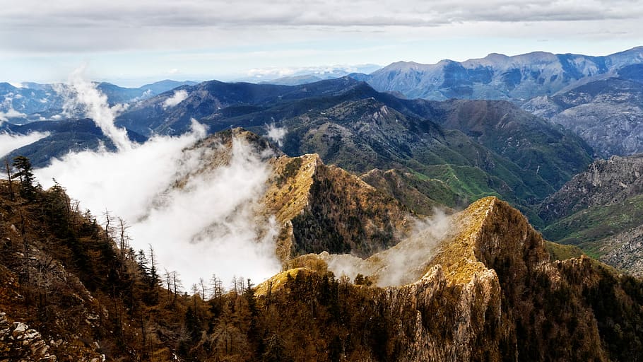 aerial photography of mountain, mountains with cover with fog at daytime HD wallpaper