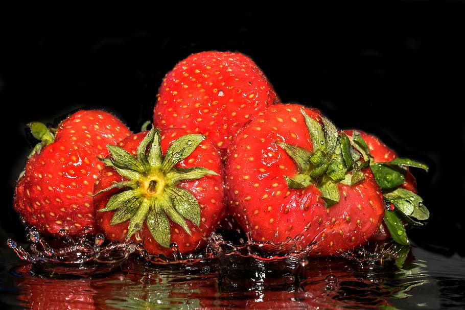 strawberries splashing on water, fruit, fruits, sweet, delicious, HD wallpaper