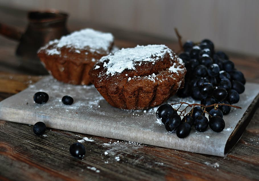 baked cupcakes beside blackberries, grapes, baking, powdered sugar HD wallpaper