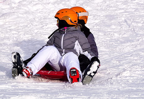 two person riding on sled, snow, winter, ice, cold, sport, toboggan HD wallpaper