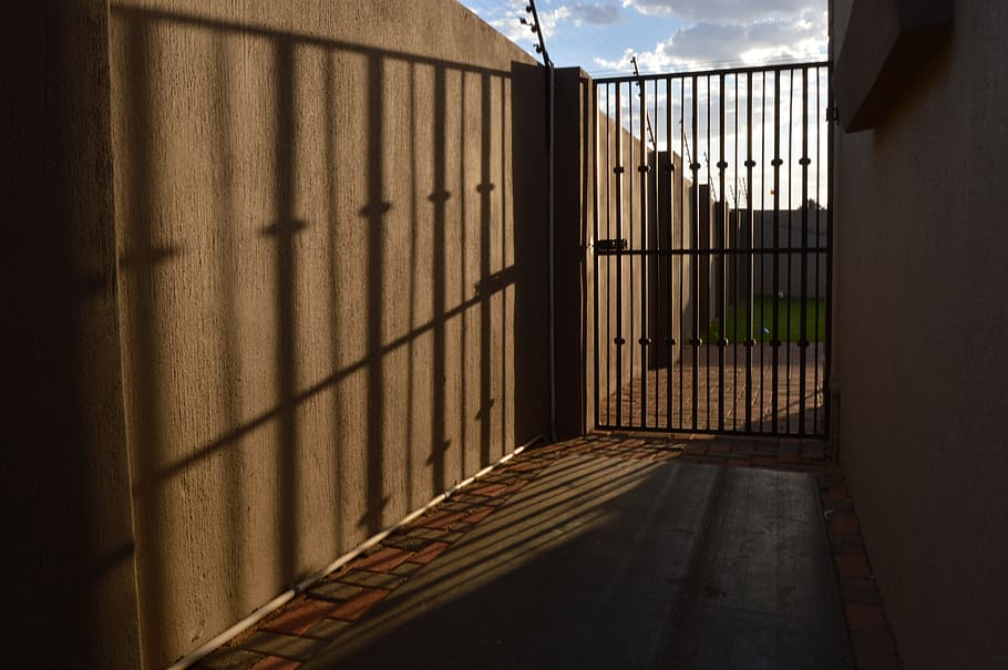 gate, wall, shadow, steel, safety, architecture, metal, security HD wallpaper