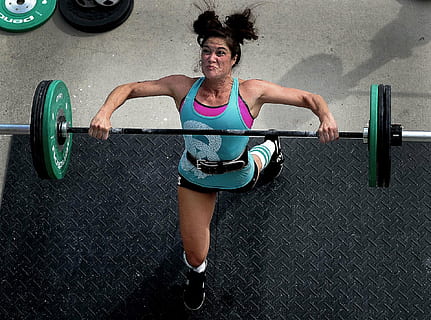 woman lifting barbell on black surface, weights, power, female HD wallpaper