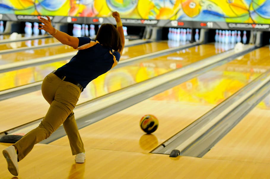 woman playing bowling, bowler, pins, ball, alley, sport, fun