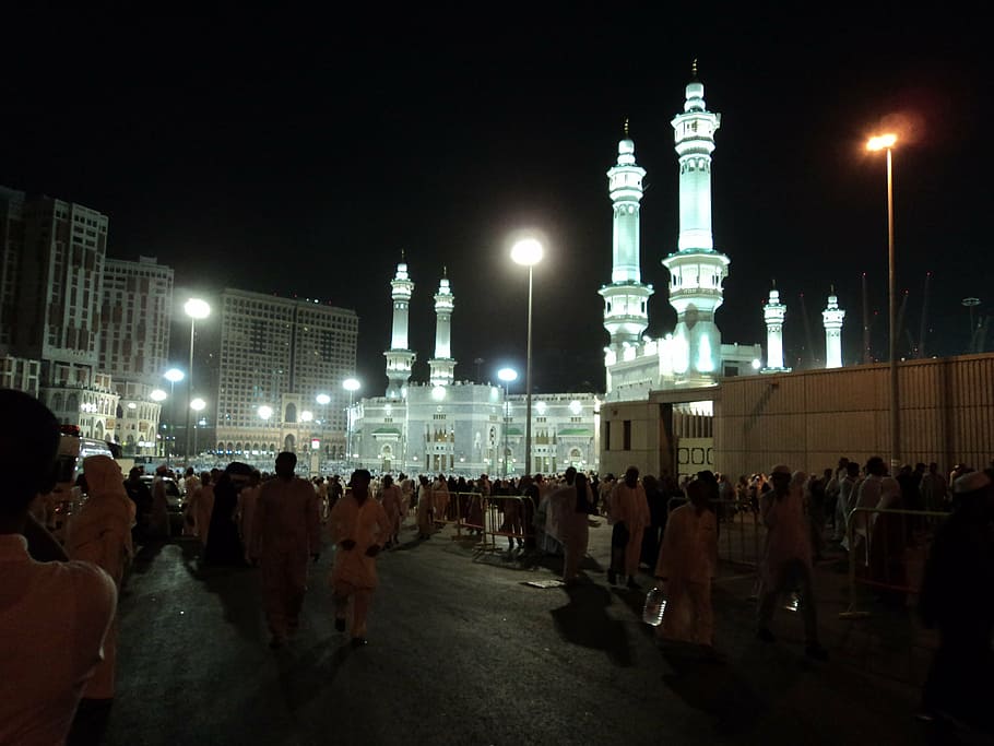 people walking on street during night time, mosque, mecca, muslim