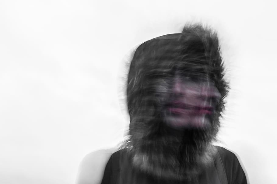 Creepy blurred photo of a person's face and a furry hood, untitled HD wallpaper