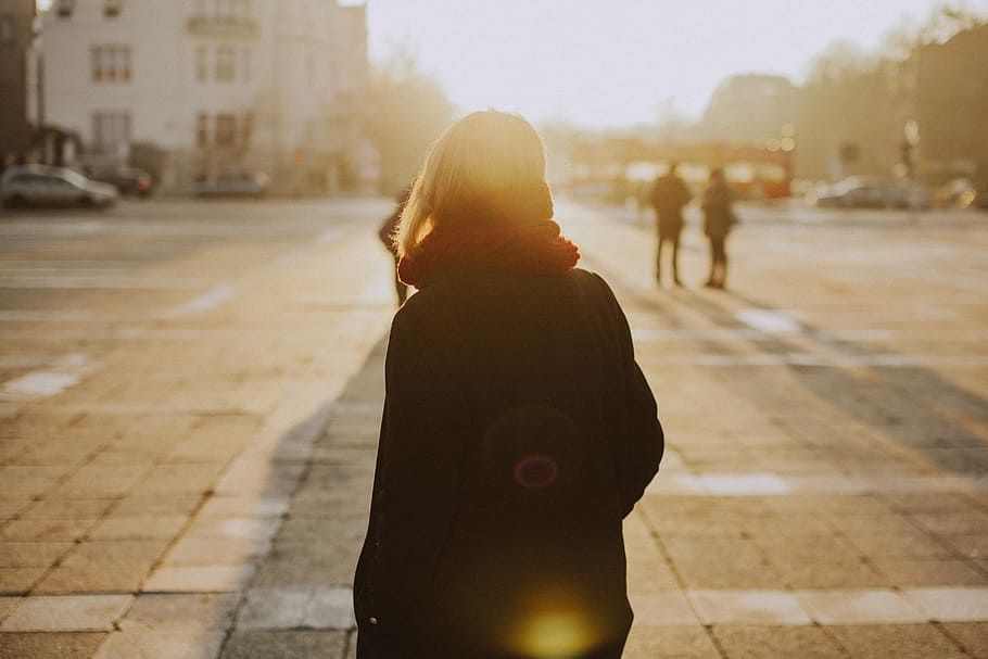 silhouette photography of woman with black jacket in road, woman wearing black hooded coat HD wallpaper