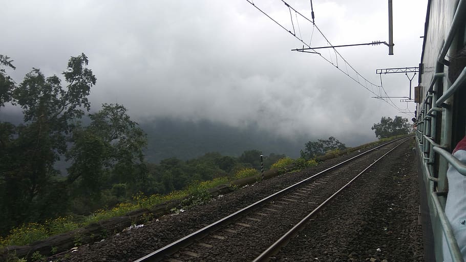 Fog, empty railroad tracks near green grass hill, train, railway HD wallpaper