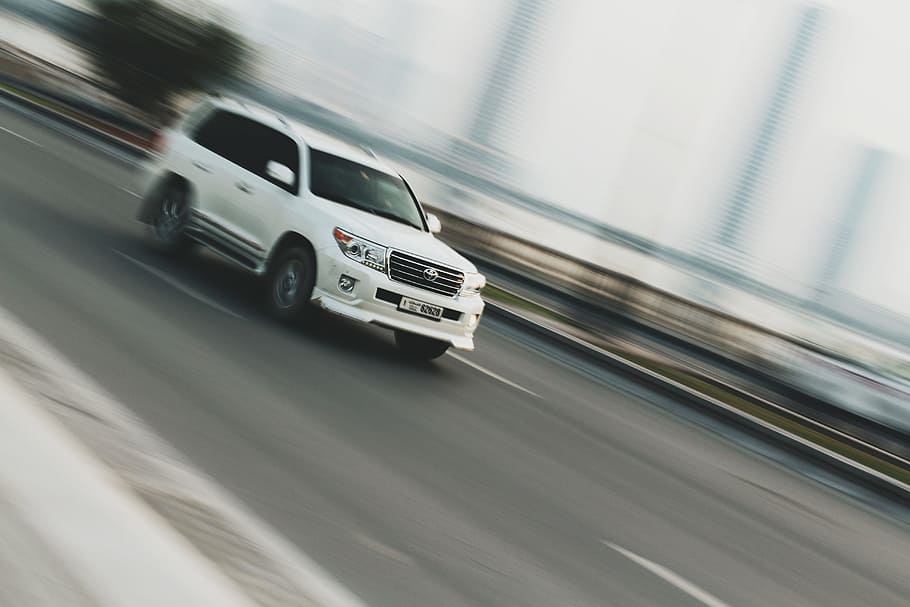 time lapse photography of white sport utility vehicle, white Toyota SUV traveling on road HD wallpaper