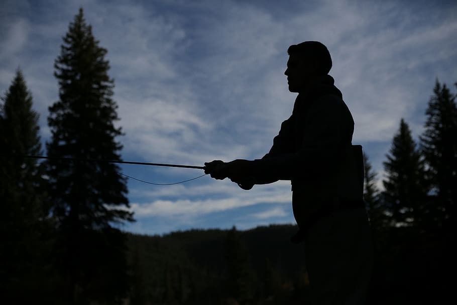 silhouette of person fishing during nighttime, silhouette photo of man fishing, HD wallpaper