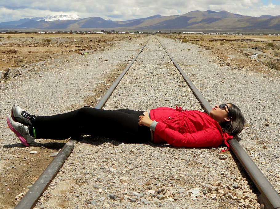 woman laying on train rail, women, pathways, platform, travelers HD wallpaper