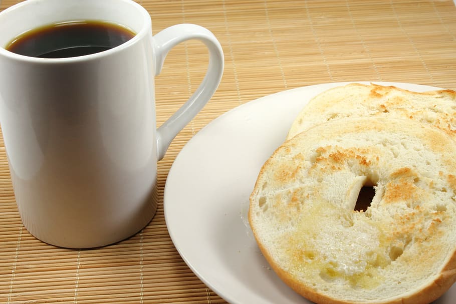 bread sliced on saucer beside cup of coffee, bagel, breakfast HD wallpaper
