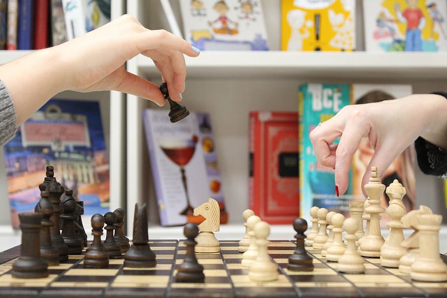 two people playing chess in library, hand, figures, pawn, palm, HD wallpaper