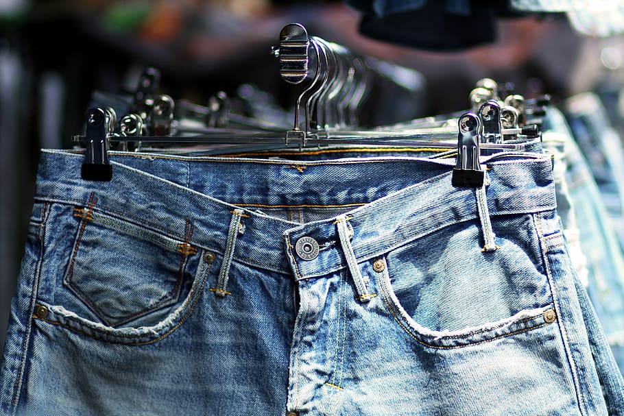 blue denim jeans hanged on silver hangers, jaffa, bazaar, store