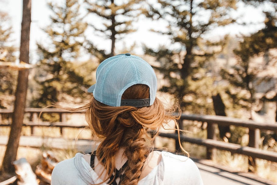 Her Hair, shallow focus photo of person wearing trucker hat, looking out HD wallpaper