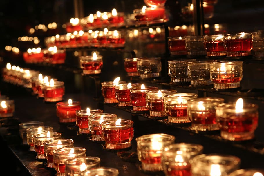 lighted tealight on rack, lit candles with glass holders, flame HD wallpaper