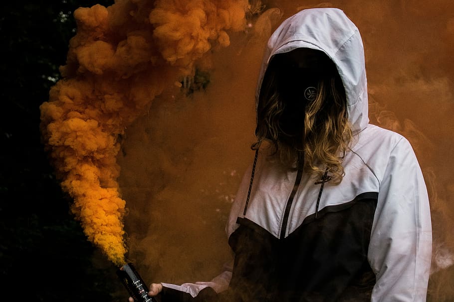 person holding orange smoke, woman holding smoke screen bottle, HD wallpaper