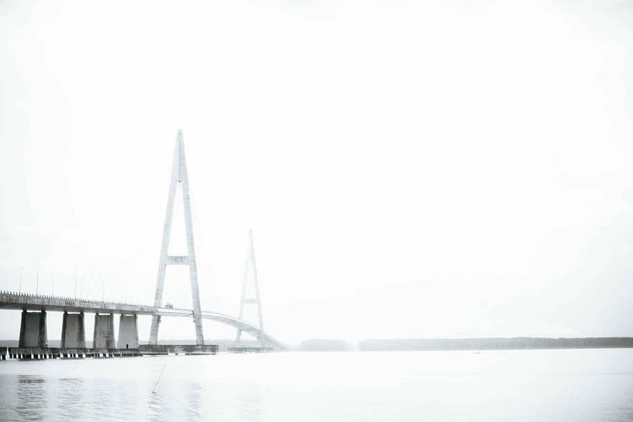 gray concrete bridge under cloudy sky, grayscale photography of suspension bridge HD wallpaper