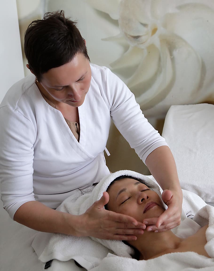 person massaging the face of woman, Massage, Fascial, Facial