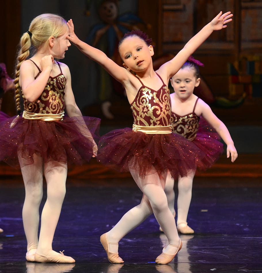 three ballerinas wearing maroon and gold dresses, ballet, children
