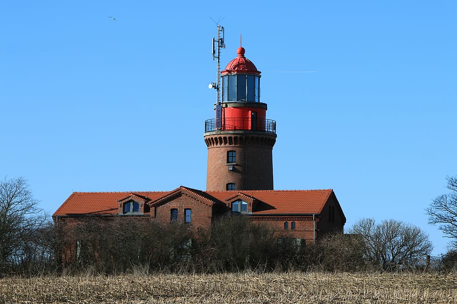 brown and red lighthouse under blue sky at daytime, bastorf HD wallpaper