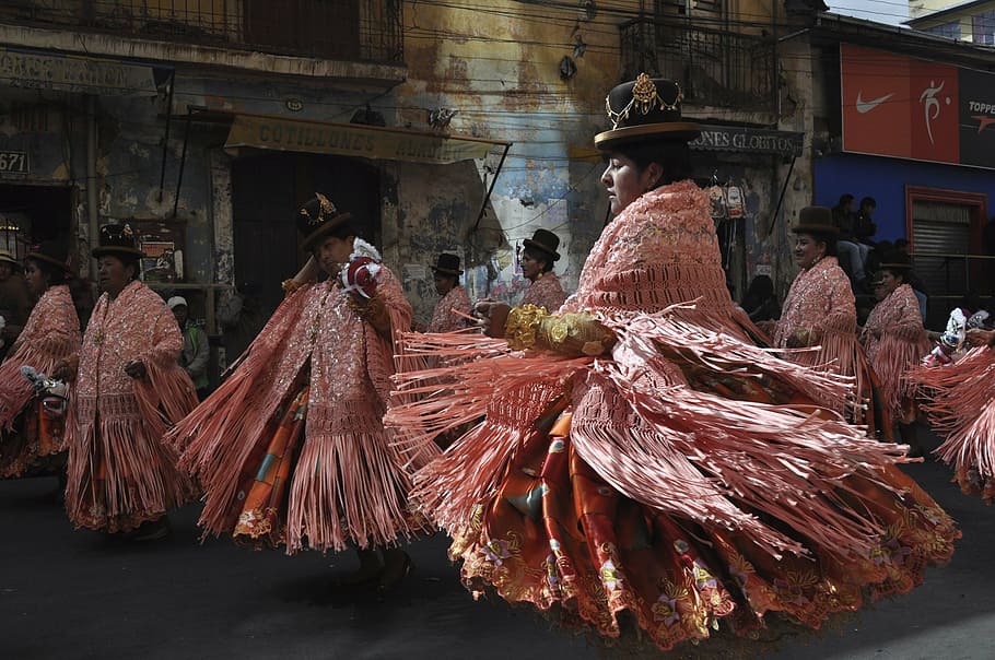 group of people dancing on street, festival, la paz, bolivia