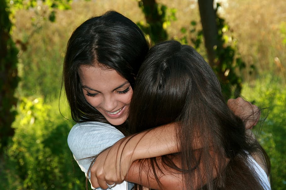 closeup photo of two women hugging each other, girls, friendship, HD wallpaper