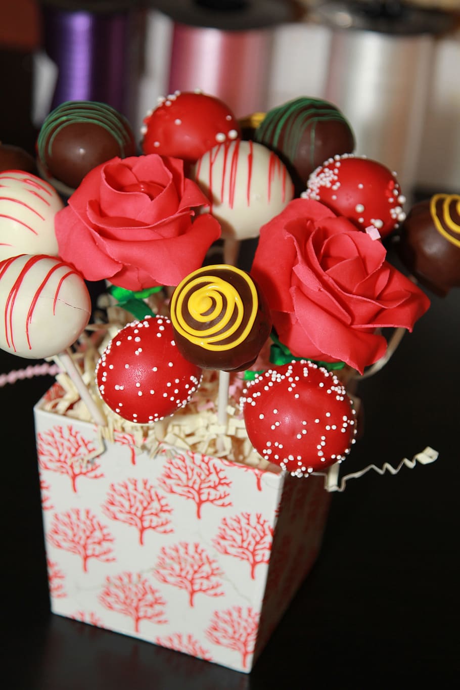 red artificial rose flowers with chocolate, strawberry, and vanilla HD wallpaper