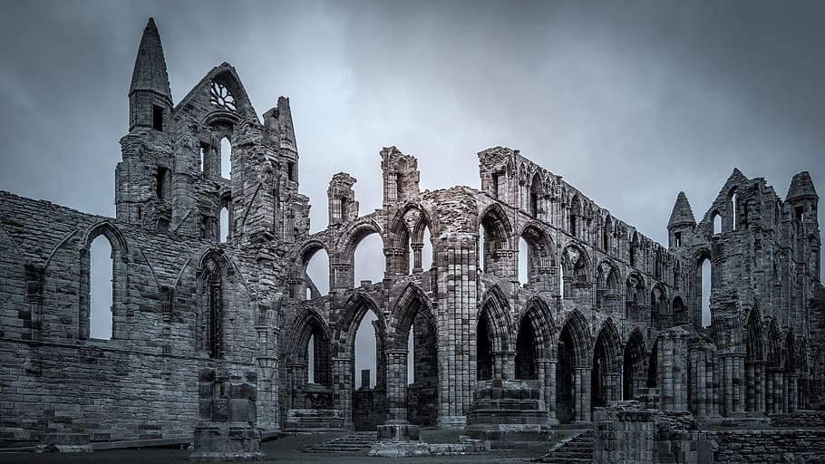 gray concrete structure under gray clouds, whitby abbey, dracula