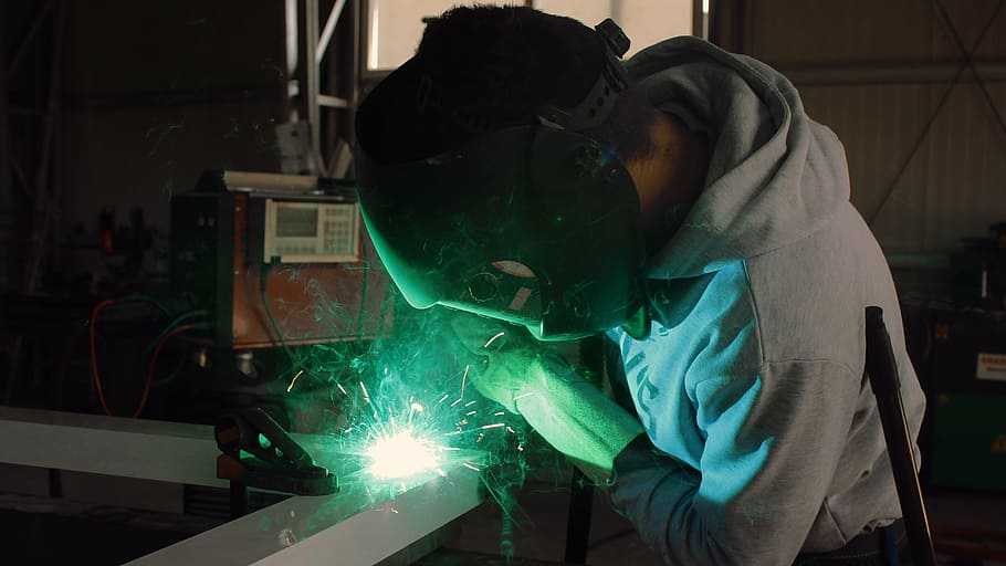 man in gray hoodie doing welding, iron, worker, industry, steel