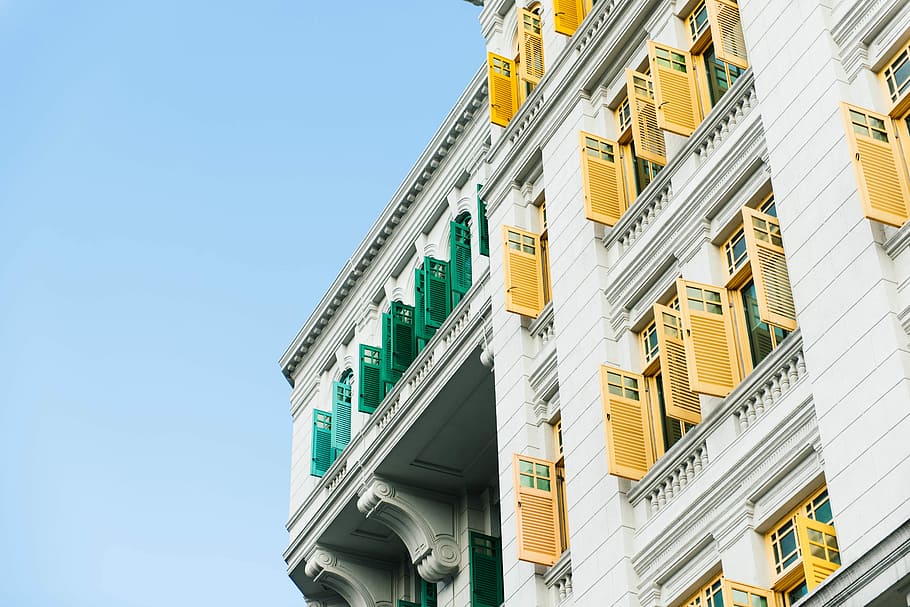 architectural photography of white building, photo of white and yellow concrete building HD wallpaper
