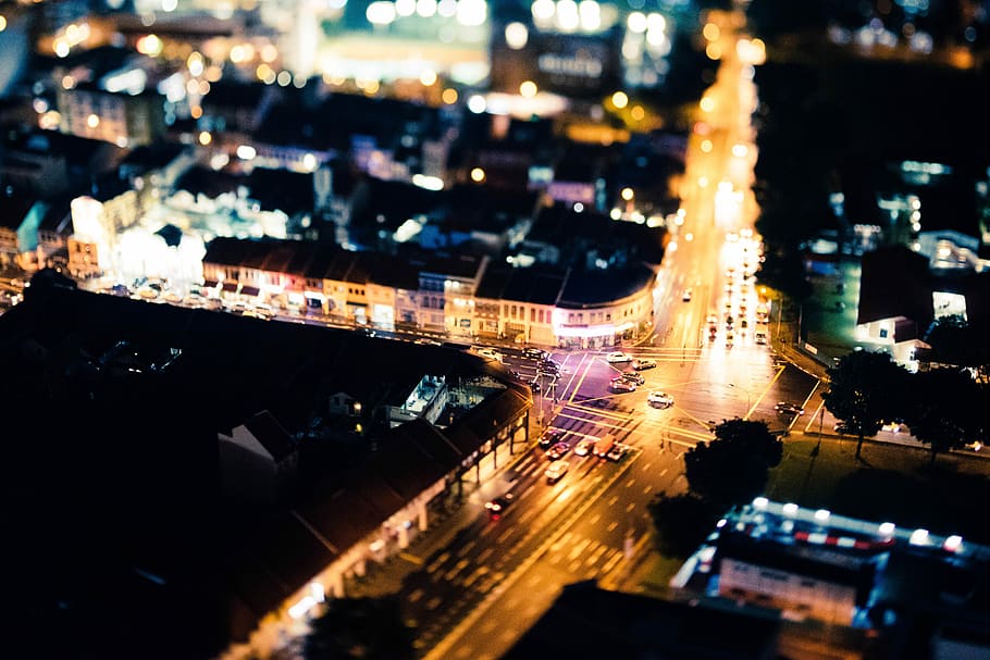 aerial photography of city buildings at night time, aerial photo of vehicles on street during nighttime HD wallpaper