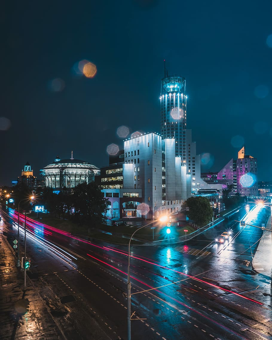 HD wallpaper: timelapse photography of vehicle passing on road in front of  white and gray concrete building, timelapse photography of buildings photo  taken during nighttime | Wallpaper Flare