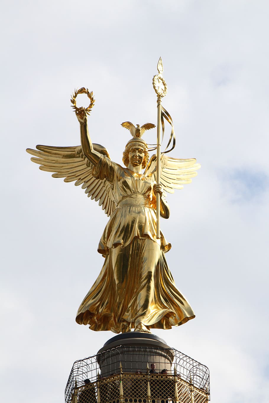 woman holding spear statue, berlin, golden, female, lady, wings HD wallpaper