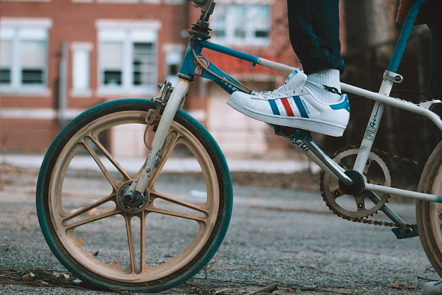 person riding on bike, person riding on white and blue bicycle HD wallpaper
