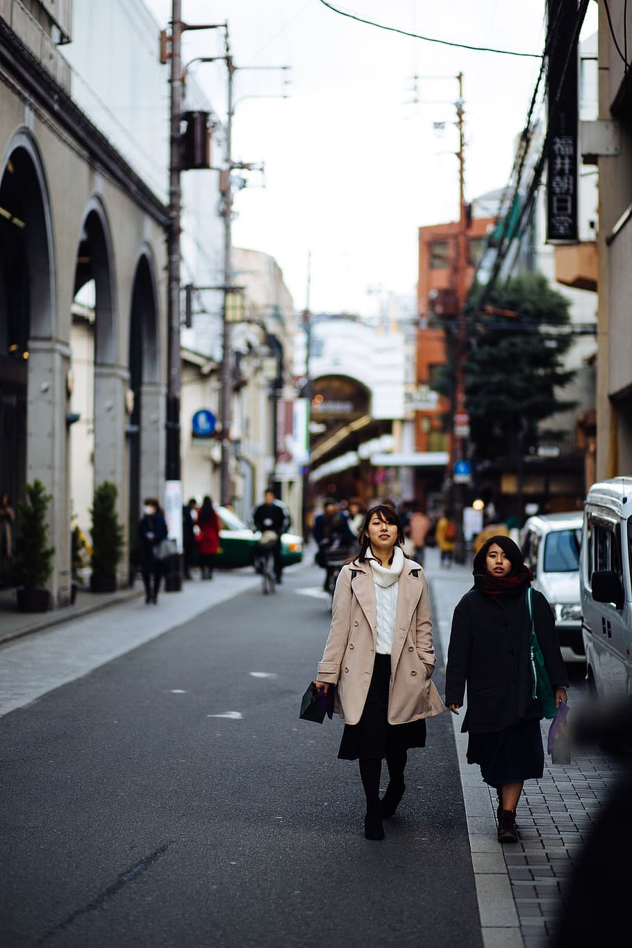 letting the Japanese roads consume me, girl in brown notched lapel coat walking on street, HD wallpaper