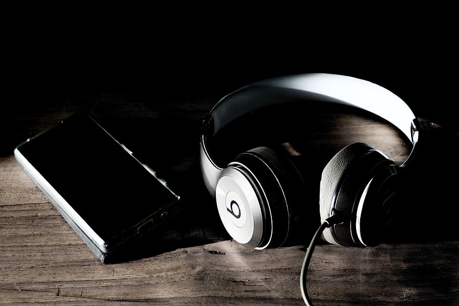 grayscale photography of Beats By Dr. Dre corded headphones, solo
