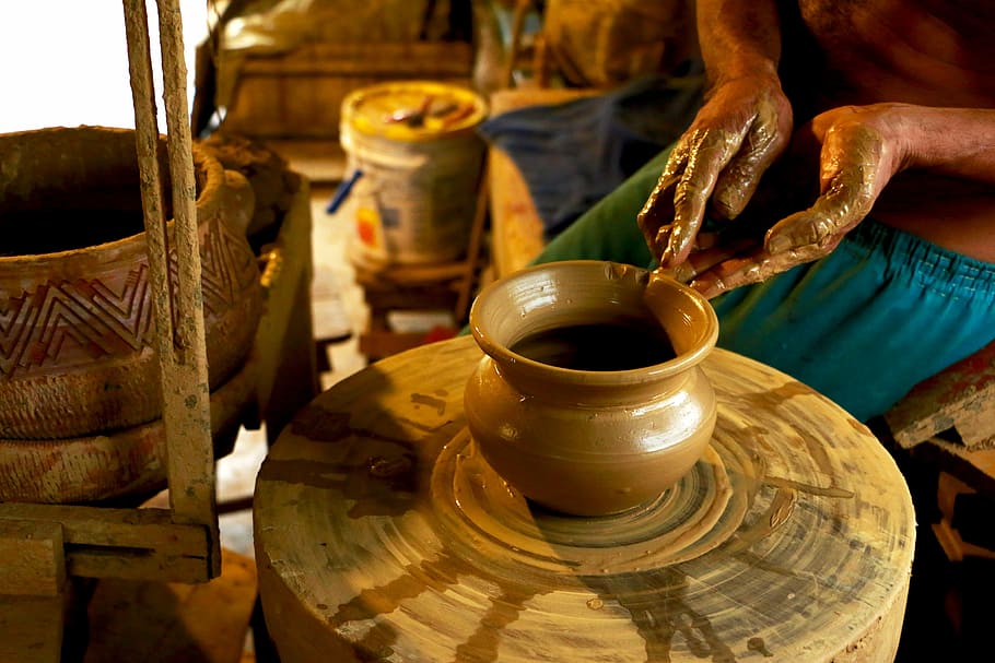 person making brown clay pot, hands, spinning, workshop, ceramics HD wallpaper