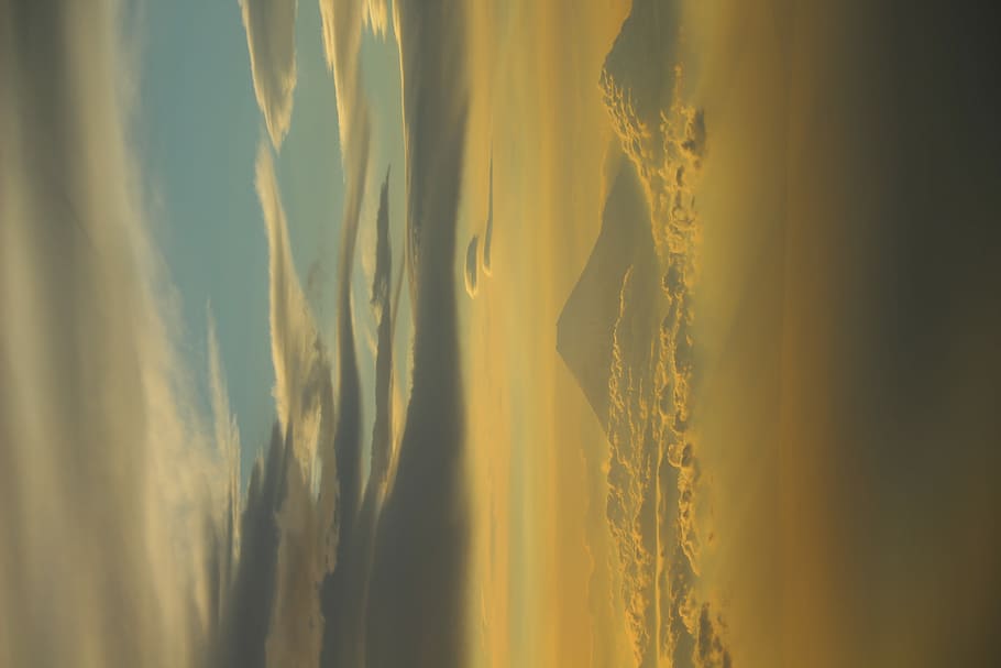 mountain covered by sky, volcano under clouds formation, sunset HD wallpaper