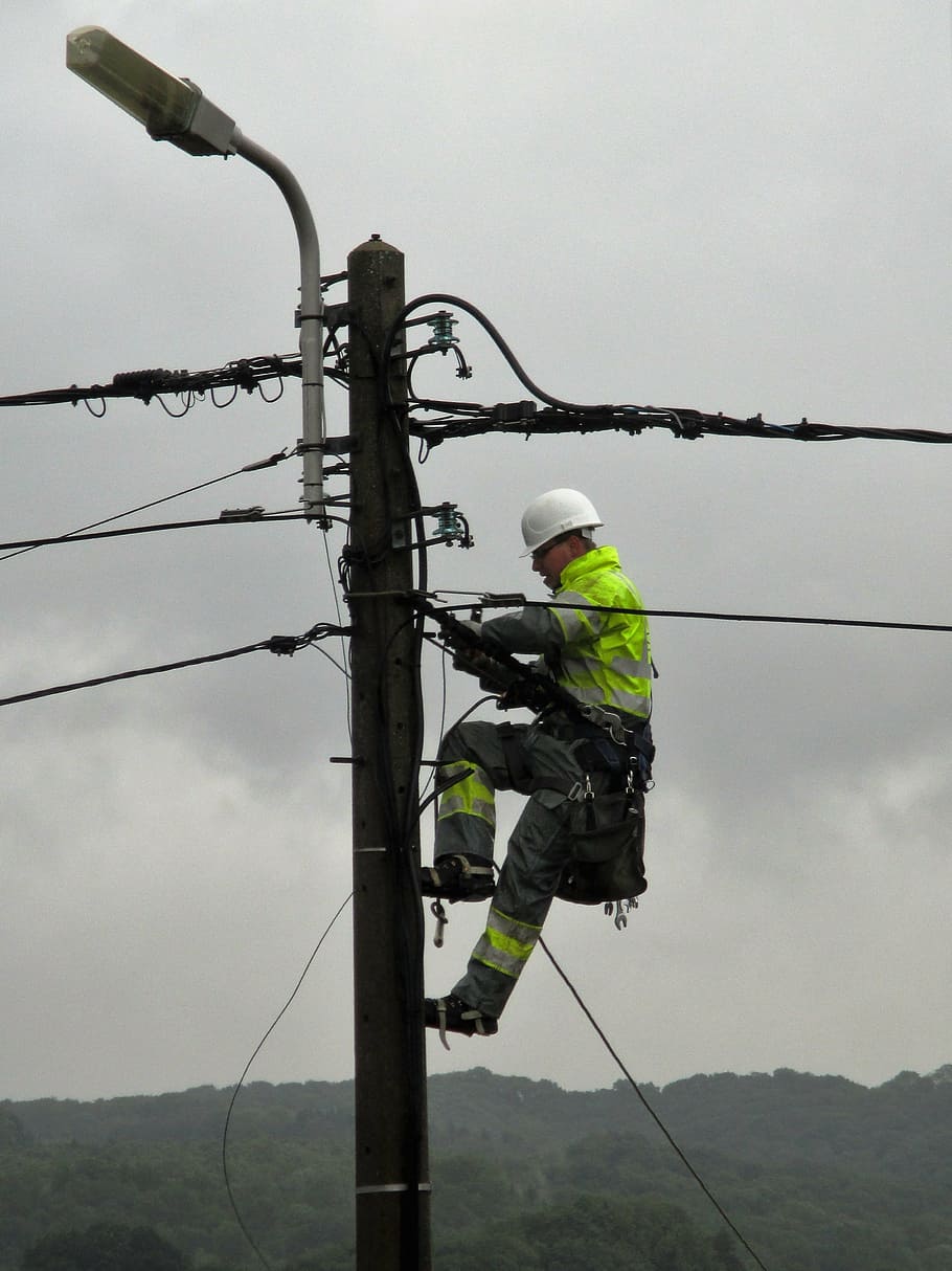 power pole, worker, electric wires, street lamp, occupation