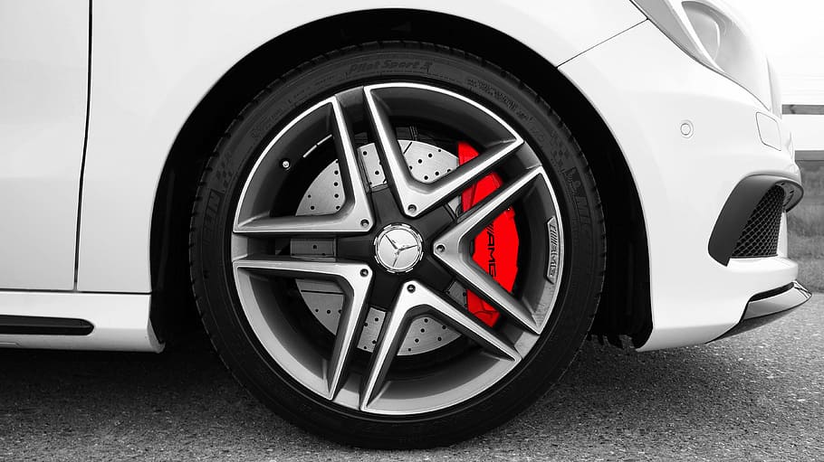 close-up photo of gray Mercedes-Benz 5-spoke vehicle wheels and tire