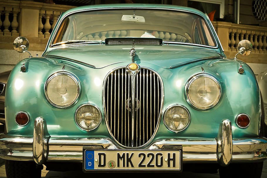 close-up photo of teal car, auto, jaguar xk, automotive, oldtimer