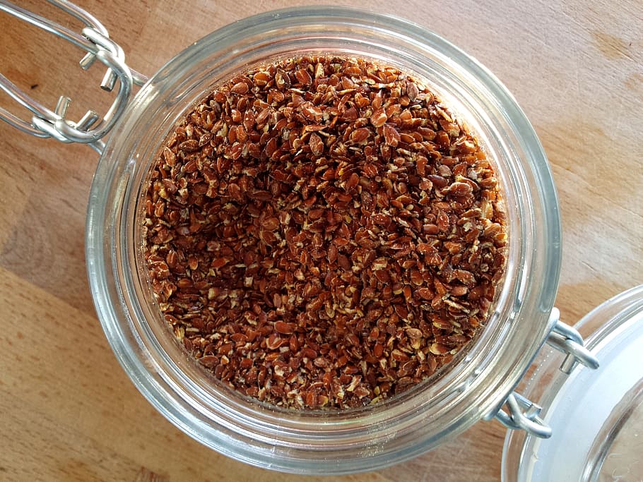 brown beans inside clear canister jar, linseed, seeds, oilseed HD wallpaper