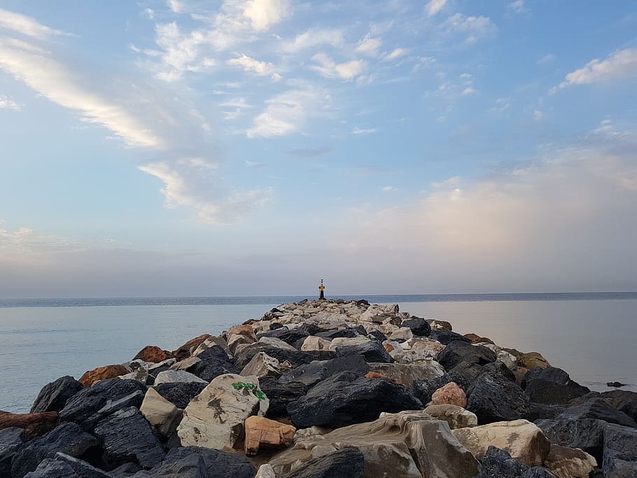 dawn, clouds, sun, sea, port, rocks, perspective, romance, calm HD wallpaper