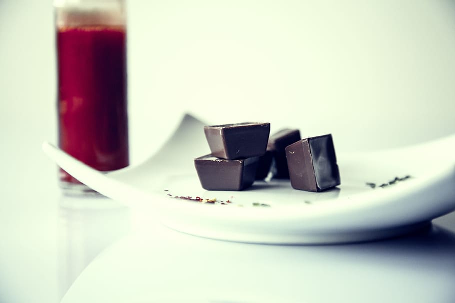 square chocolates on white ceramic plate, chili, sharp, sweet HD wallpaper