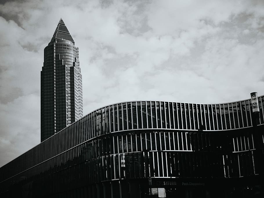 building landmark with clouds background, grayscale photography of concrete building HD wallpaper