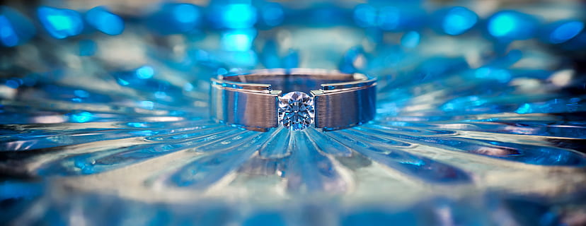 selective focus photo of silver-colored and clear gemstone ring HD wallpaper