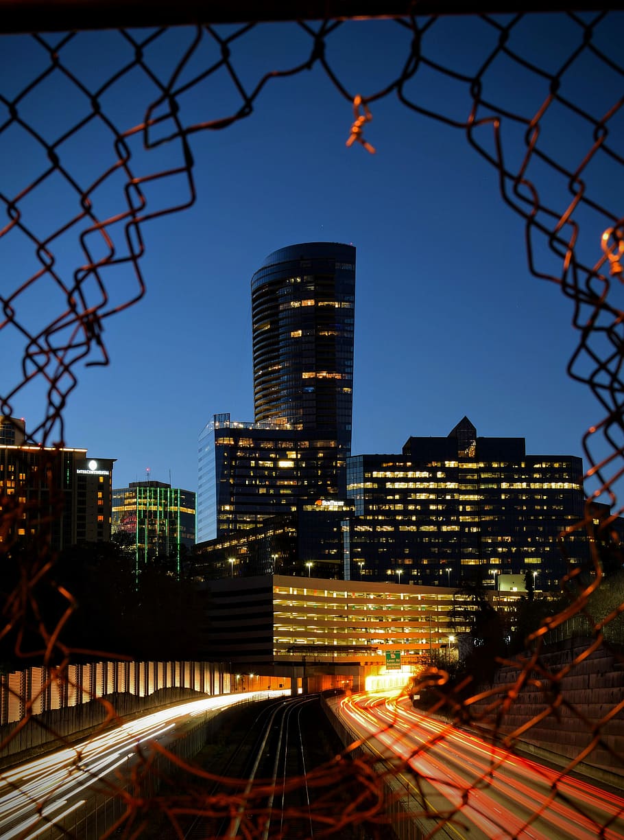 architectural photography of lighted buildings, city buildings during nighttime HD wallpaper