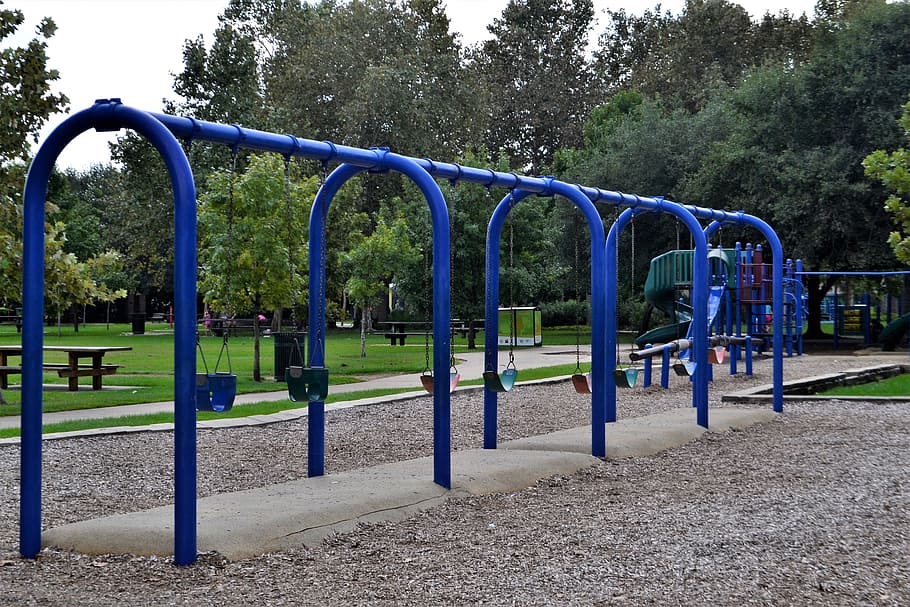 swings, playground, herman park, houston, texas, blue swings