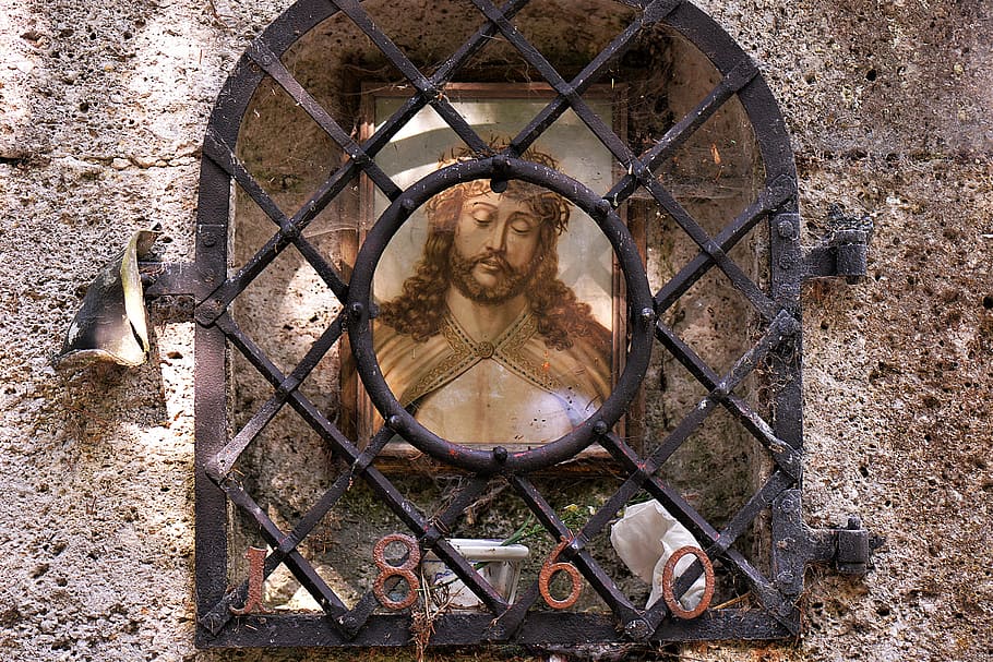 painting of Jesus Christ mounted on wall behind black grille HD wallpaper